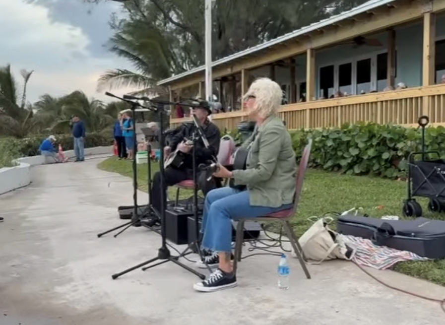 The Stray Tones performing by the water